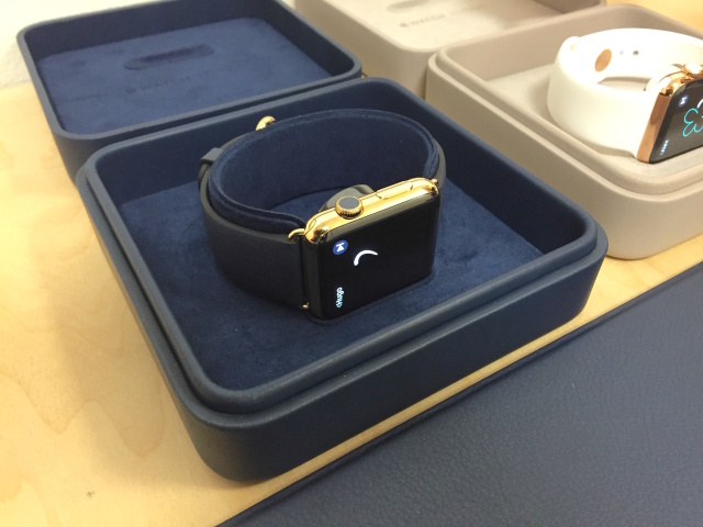 The Apple Watch Editions in their fancy cases. These also serve as chargers.