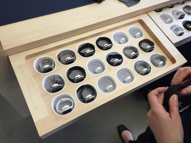 Apple Watches are all kept in a tray that employees unlock with their iPhone point-of-sale systems.
