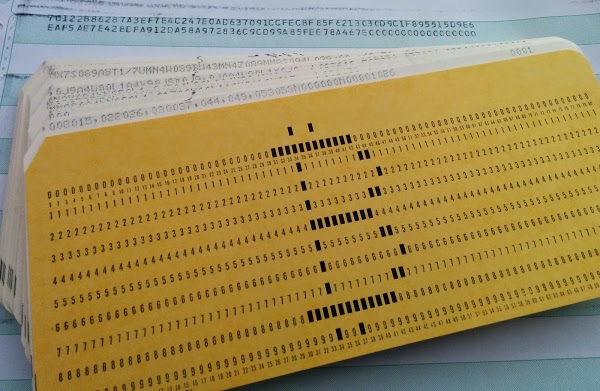 Card deck used to compute SHA-256 hashes on IBM 1401 mainframe. Behind the card deck is the line printer output showing the input to the algorithm and the resulting hash.