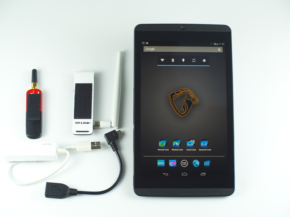 The Pwn Pad 3 comes with what you see here:  Bluetooth, external Wi-Fi and Ethernet adapters, and an OTG cable. And, oh, yeah—it's built on an Nvidia Shield tablet.