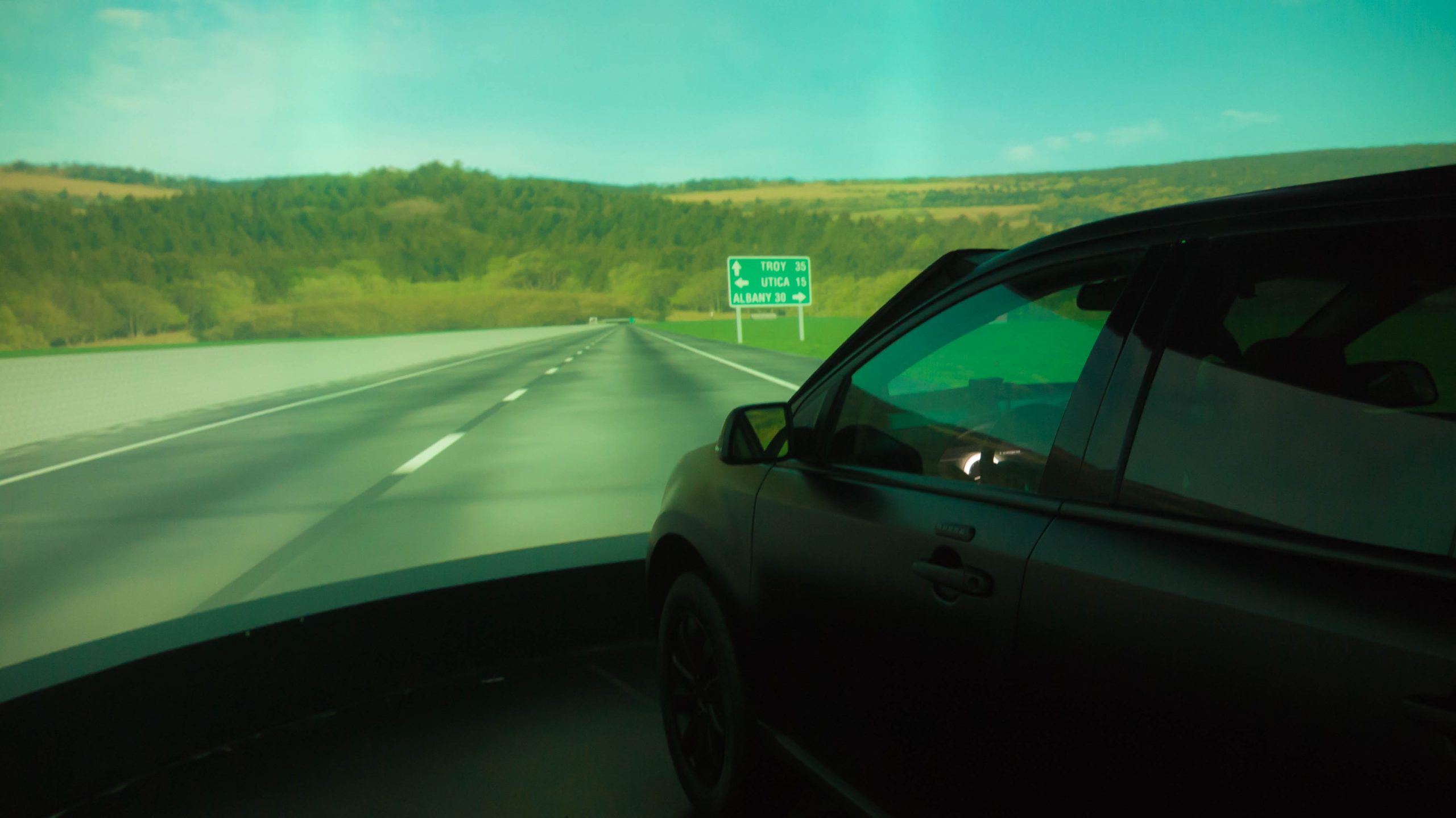 Behind the wheel of VIRTTEX, Ford's distracted driving simulator