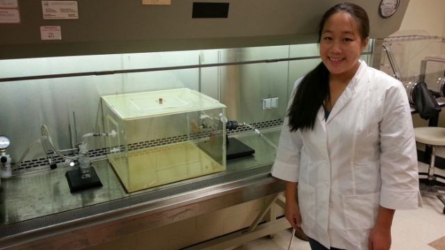 Grace Tung-Thompson shows off the vomit simulator.