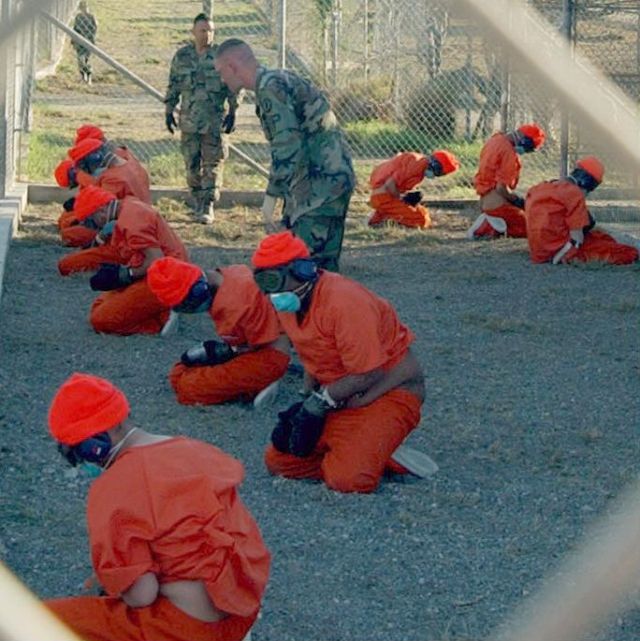In-processing of detainees at Guantanamo Bay, 2002.