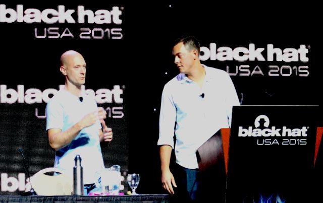 Charlie Miller (left) and Chris Valasek present the details of their hacks of the Fiat Chrysler Uconnect system at Black Hat in Las Vegas on August 5.