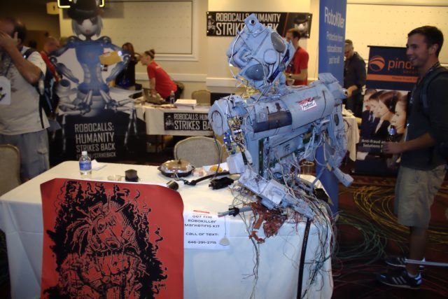 Rachel the Robot, deceased, at RoboKiller's table in the FTC robocall challenge area at DEF CON 23.