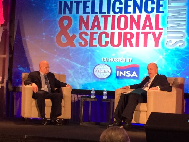 Director of National Intelligence James Clapper, left, and former DNI director and chairman of the Intelligence and National Security Alliance Ambassador John Negroponte, in a question-and-answer session following Clapper's opening speech at the Intelligence & National Security Summit in Washinton, DC on September 9.