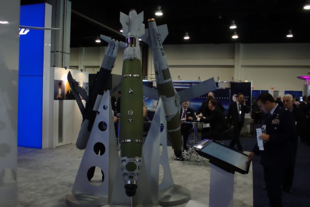 At the Boeing booth on the Air & Space exposition floor in September 2015, a rack of once and future smart bombs—JDAM and JDAM Extended Range.