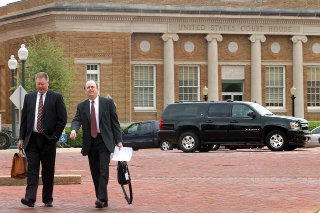 Two unidentified men leave the federal courthouse in Marshall, Texas, in 2008. (Photo by Mario Villafuerte/Bloomberg via Getty Images)