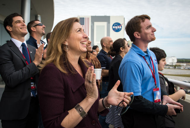 Lori Garver watches the SpaceX Falcon 9 rocket, with the Dragon spacecraft on board, launch in 2013 from Kennedy Space Center. 