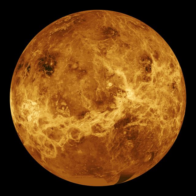 A simulated global view of Venus, without its thick clouds, taken by the Magellan spacecraft. 