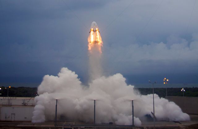 SpaceX's Crew Dragon Spacecraft completed a pad abort test in May, 2015. This image shows the vehicle's eight SuperDraco thrusters firing as intended.