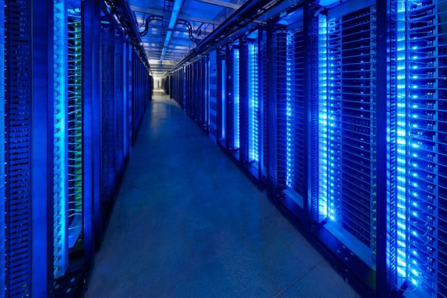 Rows of Open Compute Project racks in a Facebook data center.