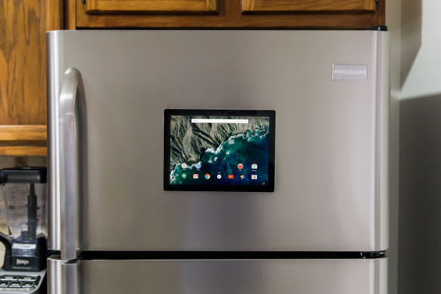 There are enough magnets in the back of a Pixel C that it can stick to a refrigerator. 