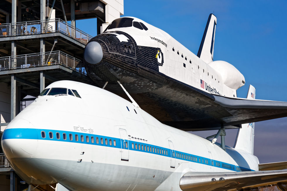 Independence sits atop the Shuttle Carrier Aircraft.