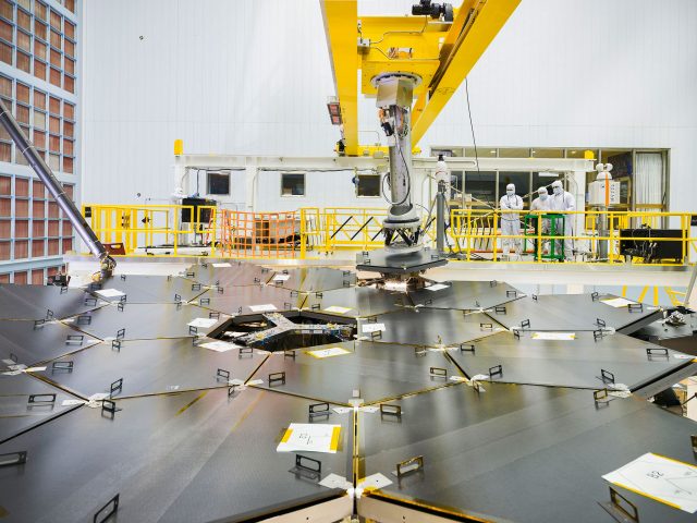 Recently, the James Webb Space Telescope team used a robotic arm to install the last of the telescope's 18 mirrors onto the telescope structure.