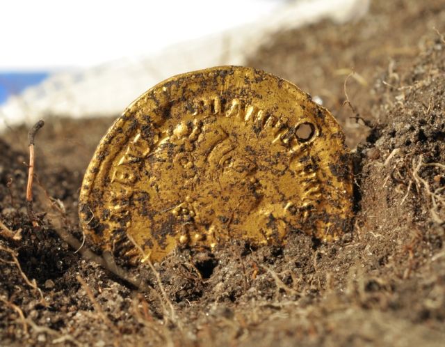A Roman coin found at the site of Sandby Borg, whose inhabitants probably included a number of unemployed Roman soldiers.