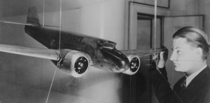 Clarence L. "Kelly" Johnson, seen here with a wind tunnel model of the Lockheed Electra, the first of Lockheed's designs that he influenced.