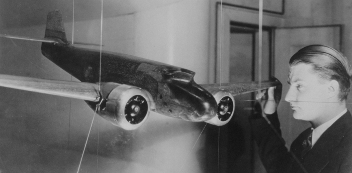 Clarence L "Kelly" Johnson, seen here with a wind tunnel model of the Lockheed Electra, the first of Lockheed's designs that he influenced.