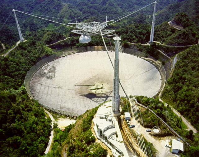 That's a big dish! The Arecibo radio telescope in its salad days.