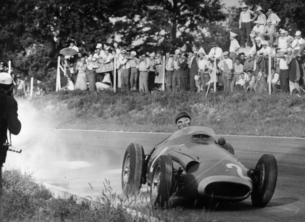 September 11, 1957:  World champion Argentinian racing driver Juan Manuel Fangio in action driving a Maserati at the 1957 Italian Grand Prix at Monza. He finished second behind Stirling Moss in a Vanwall.