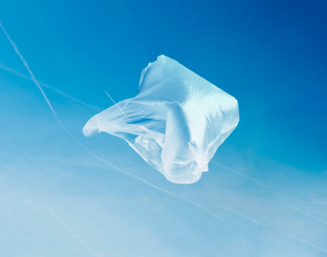 Plastic bag flying through the air, <em>American Beauty</em>-esque.