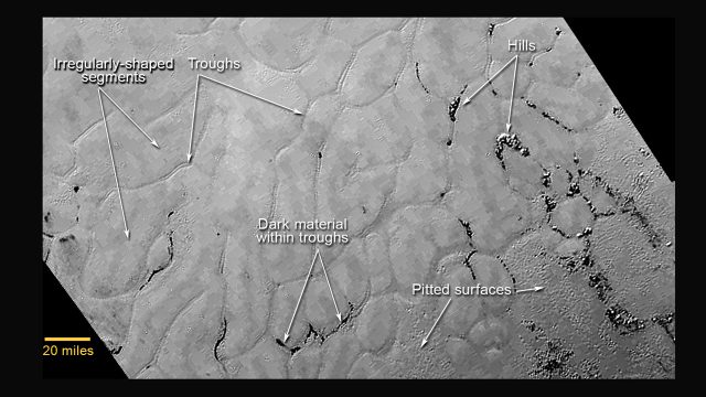 What are the strange 'floating hills' on Pluto?