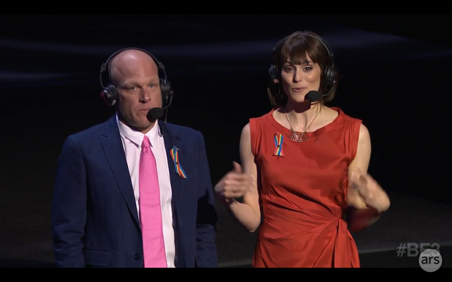 Presenters Adam Sessler and Morgan Webb sport rainbow pins during Bethesda's pre-E3 press conference.