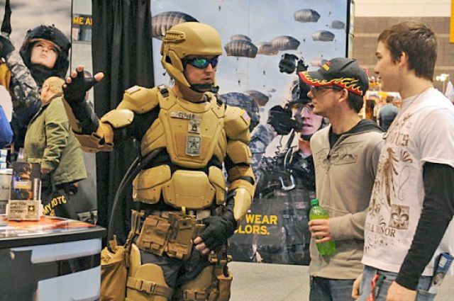 An Army soldier wears conceptual "future soldier" armor at the Detroit Auto Show in 2012. If the Special Operations Command's TALOS project is successful, soldiers may wear armored exoskeletons for urban combat in the near future.