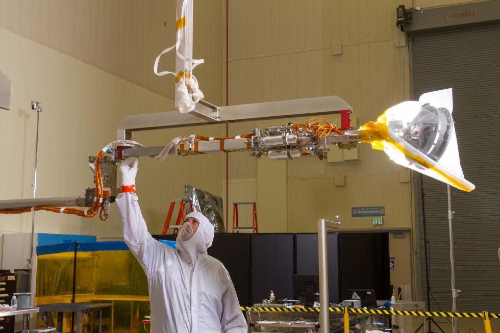 The Touch-and-Go Sample Arm Mechanism is tested in the Lockheed Martin facility.