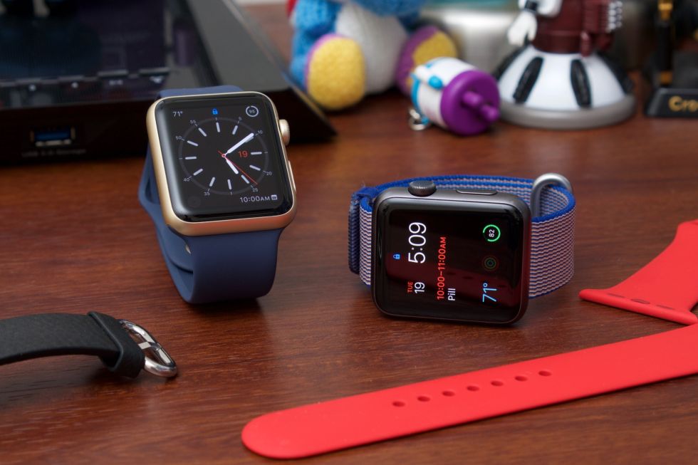 Two current-gen Apple Watch Sport models.