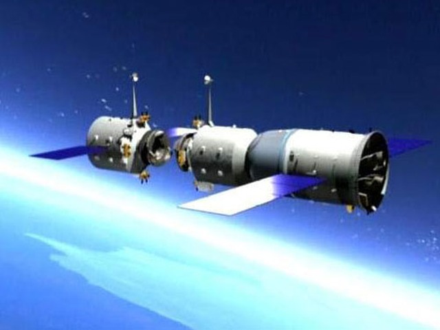 Artist's concept of Tiangong-1 space station with a Shenzhou spacecraft docking. 