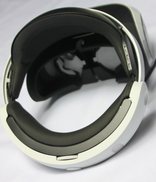 The original PSVR used traditional curved lenses in a relatively bulky setup.
