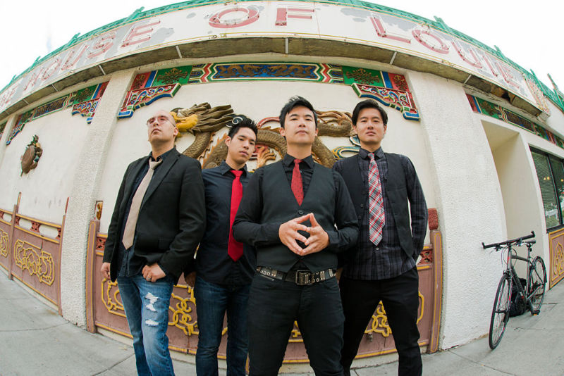 Portrait of Asian-American band The Slants (L-R: Joe X Jiang, Ken Shima, Tyler Chen, Simon 'Young' Tam) in Old Town Chinatown, Portland, Oregon, in 2015.