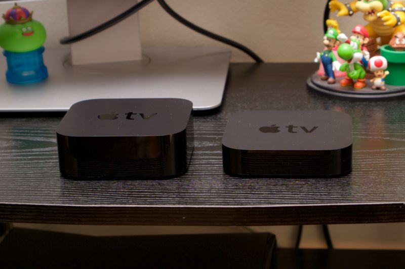 Two streaming devices side-by-side on an entertainment center.