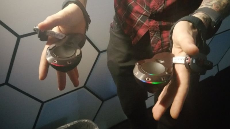 SteamVR's new prototype controllers stay in place even when you open your hands, thanks to a hook around the back of the palm.