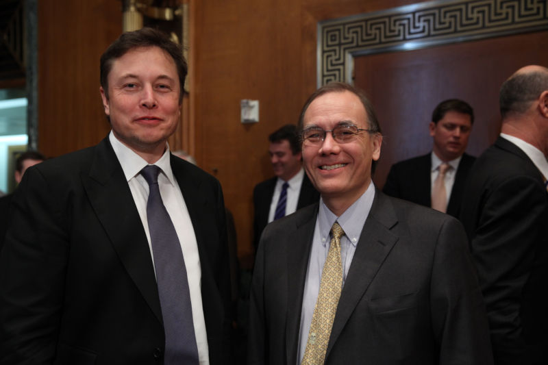 Elon Musk of SpaceX, left, and Scott Pace, right, of George Washington University, testify before the Senate Subcommittee on Defense under the Committee on Appropriations in 2014.