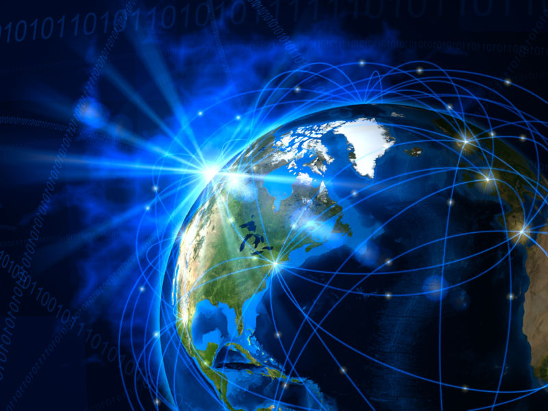 An illustration of the Earth, with lines surrounding the globe to represent a telecommunication network.