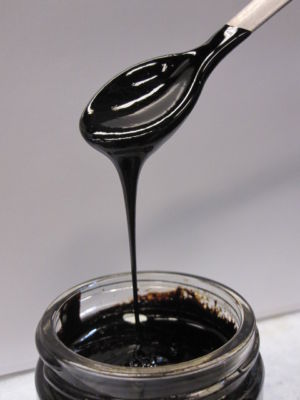 Biocrude oil, produced from wastewater treatment plant sludge, looks and performs virtually like fossil petroleum.