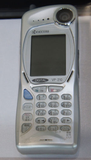 The Kyocera VP-210, released in 1999, was one of the first camera cell phones.