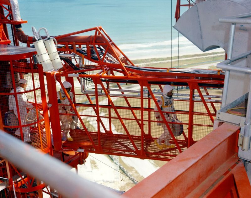 The crew of Apollo 1 crosses the gantry to the spacecraft on the day of the fire, January 27, 1967.