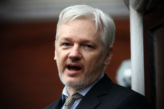 photo of Assange weasels out of pledge to surrender if Manning received clemency image
