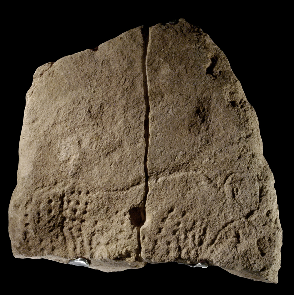 38,000-year-old carving includes enigmatic “punctuation