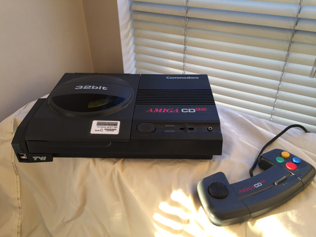 The Amiga CD32, with modem attachment. From the author's private collection.