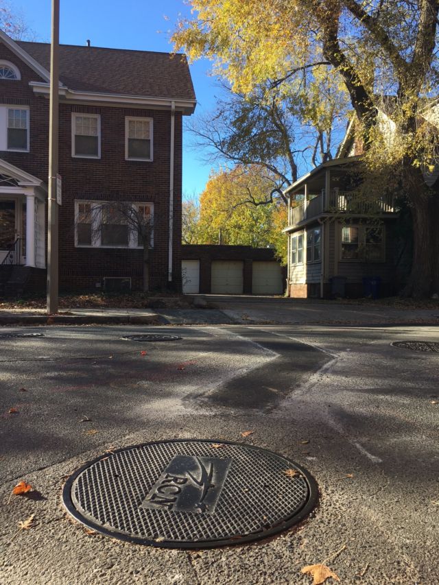 The RCN manhole across the street from Corman's house.