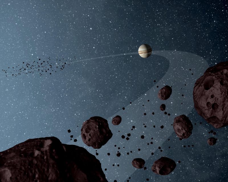 NASA has selected two new missions to explore asteroids, including the Trojan asteroids in Jupiter's orbit depicted in this artist's concept (not at all to scale).