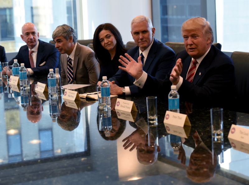 Donald Trump (right) met with numerous tech executives, including Facebook COO Sheryl Sandberg (center), and Amazon CEO Jeff Bezos (left) on December 14, 2016.