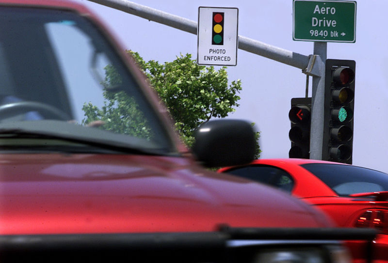 A sign posted on traffic signals at the corner of Aero Drive and Murphy Canyon Road near the I-15 in San Diego.