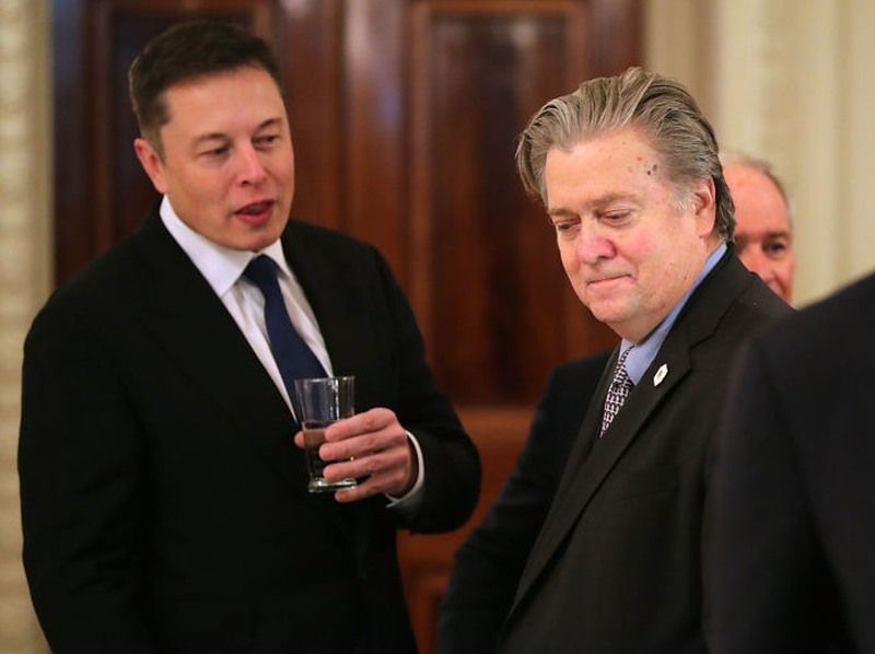 SpaceX and Tesla CEO Elon Musk talks with White House Chief Strategist Steve Bannon at a Policy Forum in February.