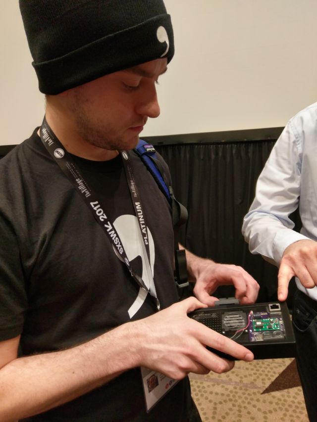 George Hotz shows off his own Comma Neo device.