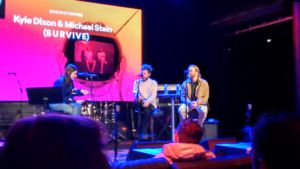 Michael Stein (far right) and Kyle Dixon of S U R V I V E / <em>Stranger Things</em> fame. (Spotify wouldn't allow cameras with detachable lenses during the taping; apologies on the Moto G 2014 image quality.)